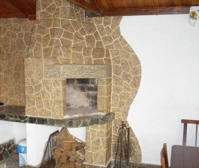 Отделка камина камнем (44 фото): натуральная природная плитка и каменная крошка