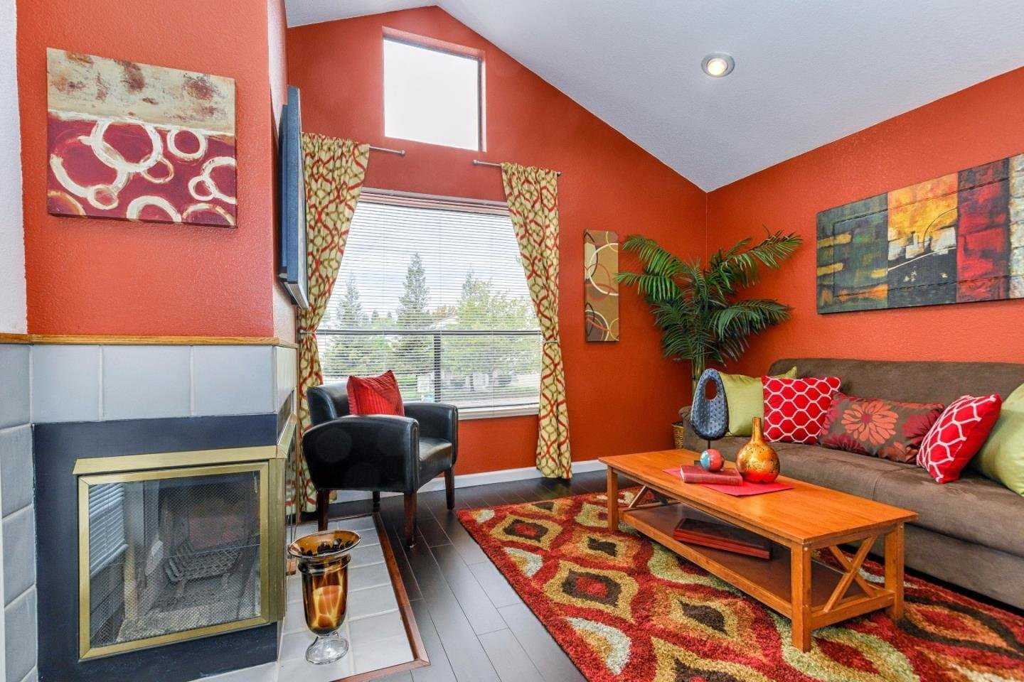Оранжевая гостиная - 71 фото украшения яркой и веселой комнаты